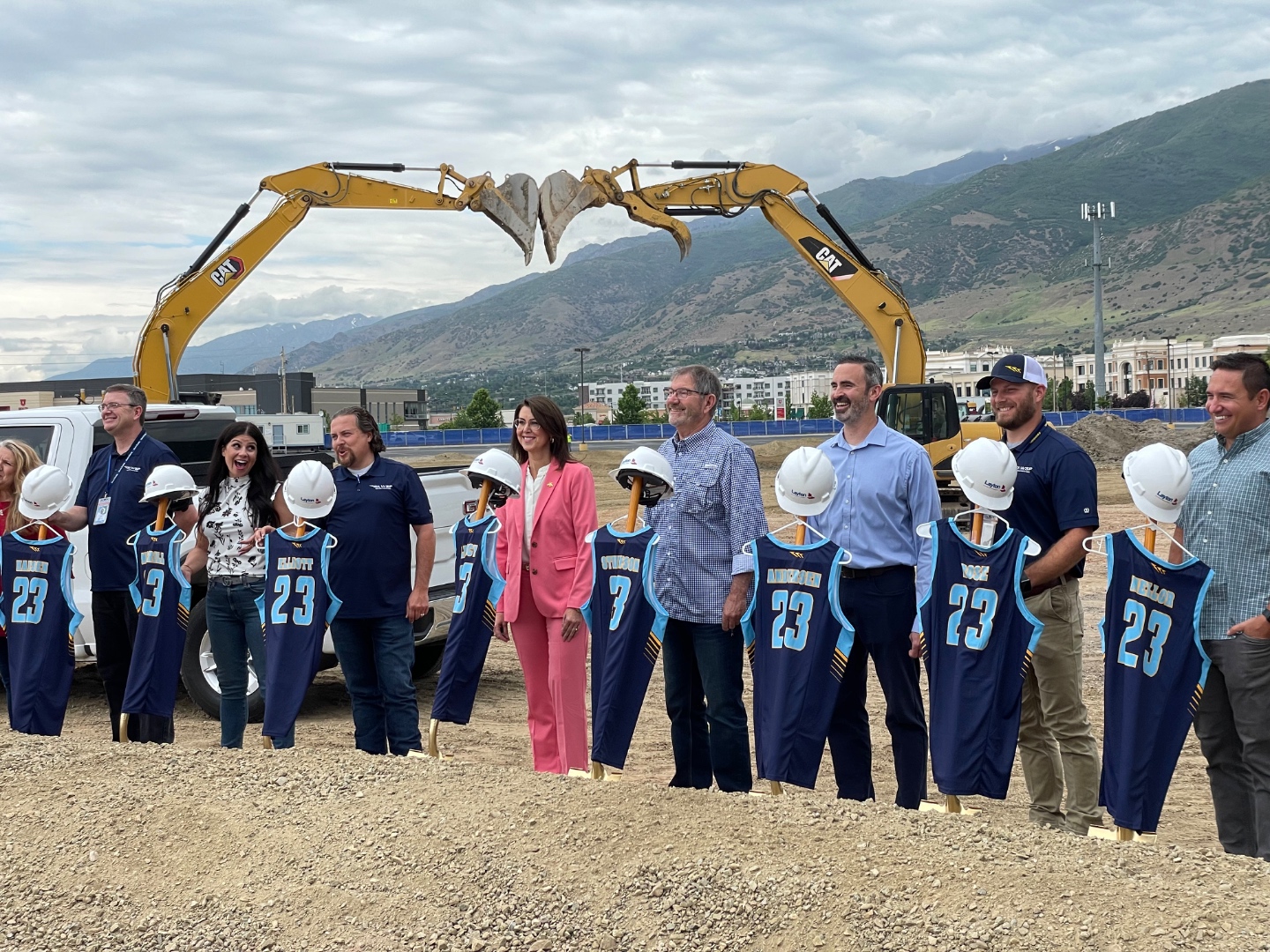 Outdoor groundbreaking event with professional audio