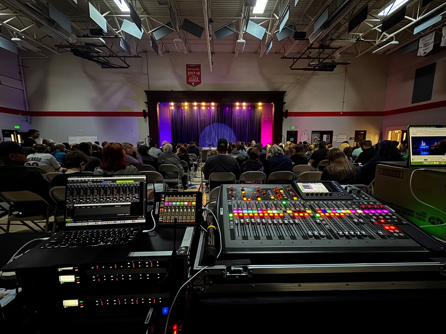 Front of house mix position during live school production in Treasure Valley Idaho, Behringer X32 digital mixer, packed house
