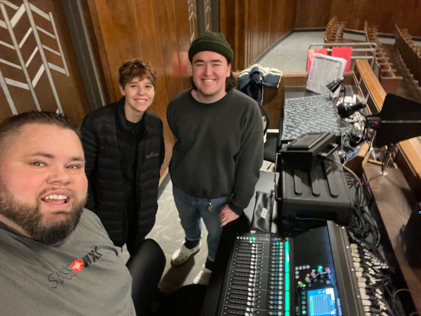 High school students operating a mixing console at a theatre production in the Treasure Valley, Idaho, SwissMixx Audio student training program