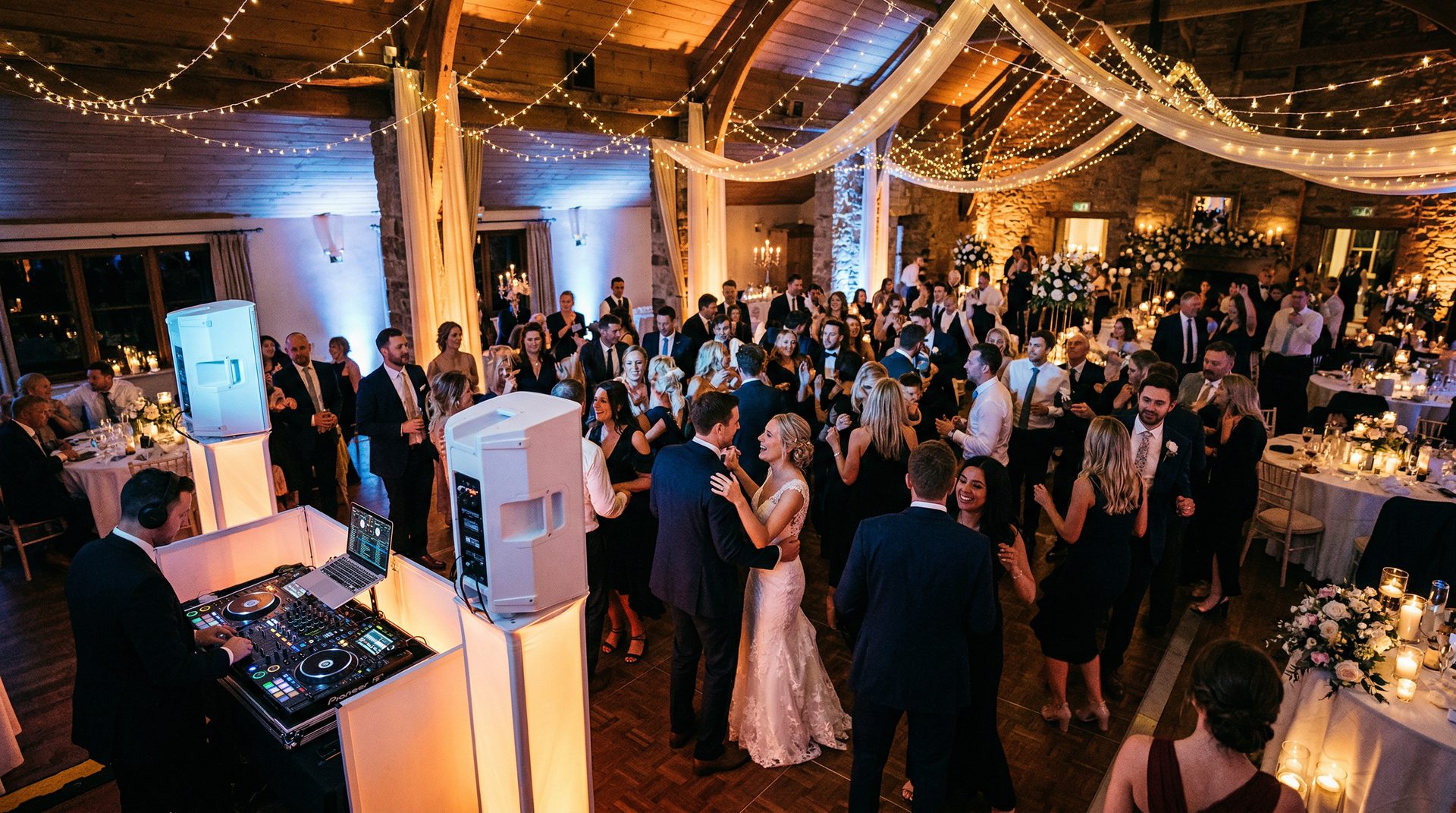 Wedding reception setup at a barn venue, SwissMixx Audio Teton Valley Idaho wedding DJ