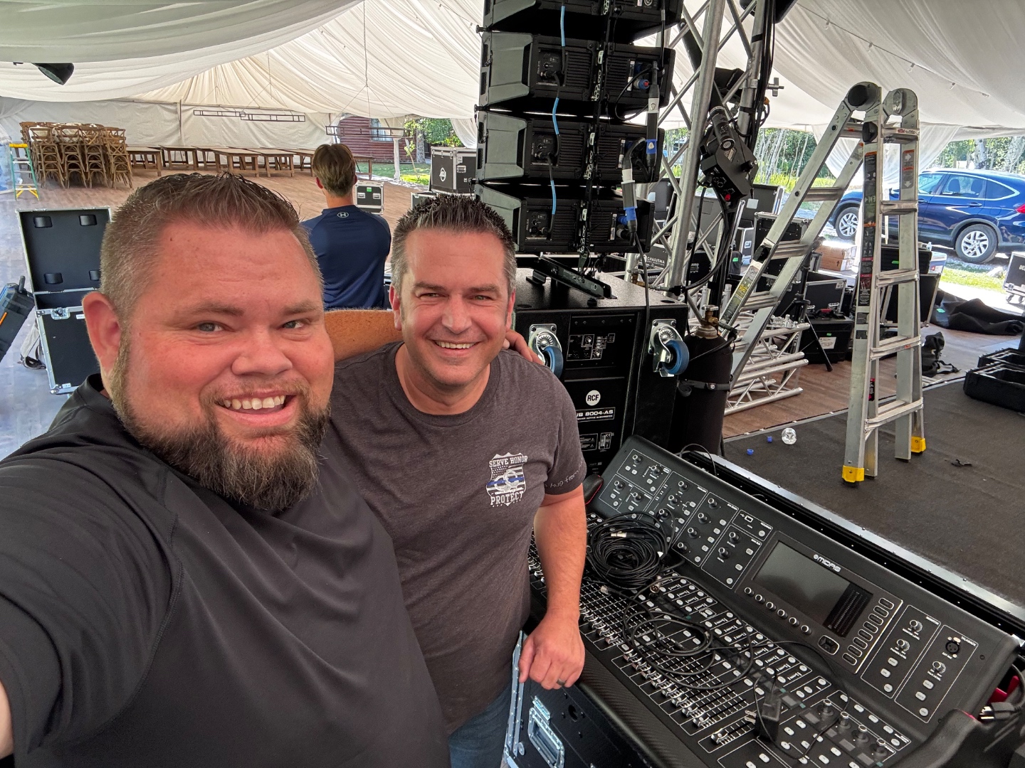 SwissMixx Audio crew and RCF line array rig setup inside wedding reception tent, Teton Valley Wyoming