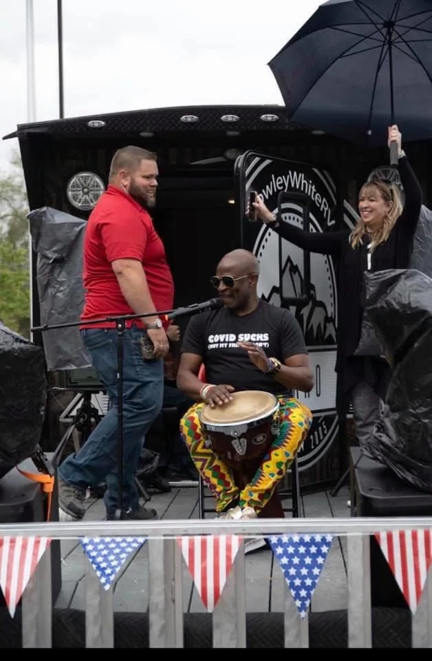 Mark Christiansen and Alex Boye performing live on a moving trailer stage for essential workers during COVID, SwissMixx Audio mobile concert