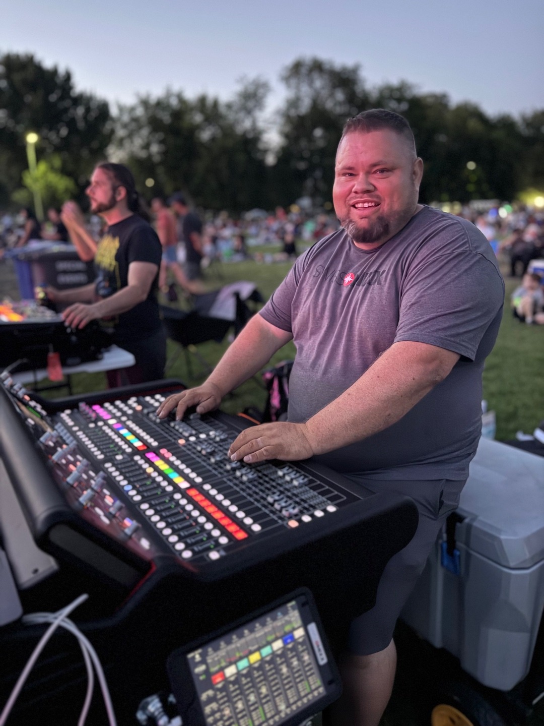 SwissMixx Audio owner Mark at the mixing console at a destination mountain outdoor event, McCall Idaho wedding audio