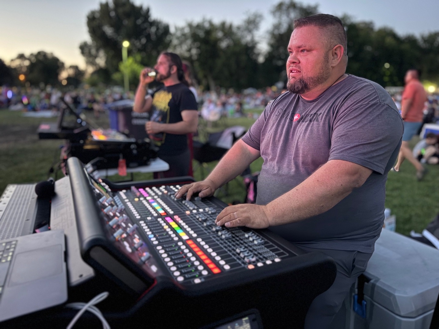 SwissMixx Audio engineer at the mixing console during an outdoor event in Meridian Idaho Treasure Valley