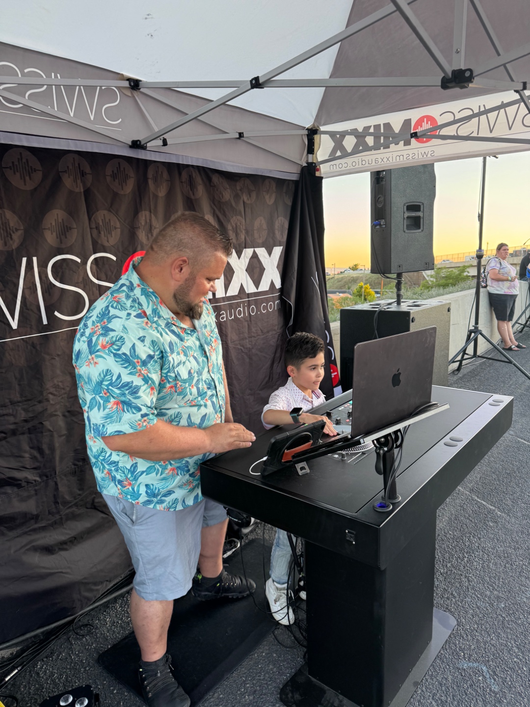 Mark at the DJ booth during a Boise Idaho sunset wedding, SwissMixx Audio professional wedding DJ Treasure Valley
