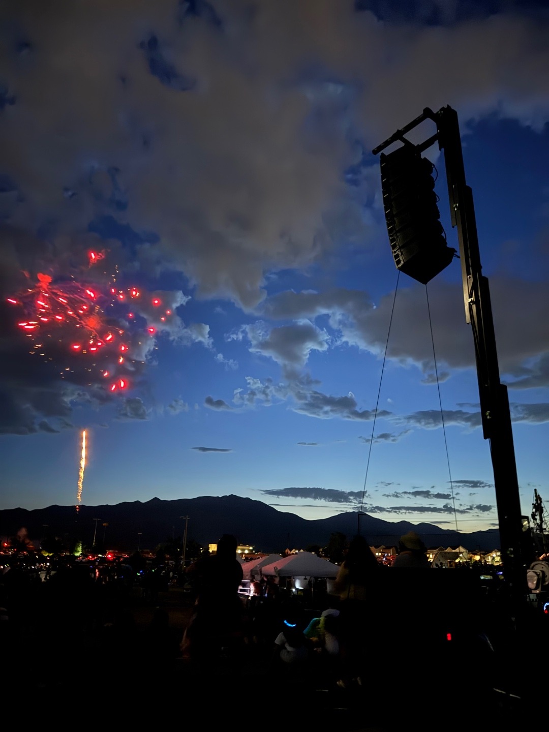 RCF line array PA system deployed at dusk during an Idaho fireworks event, SwissMixx Audio professional outdoor sound